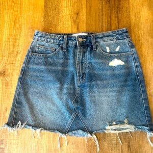 Women’s distressed denim skirt